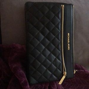 Gently used Michael lots clutch